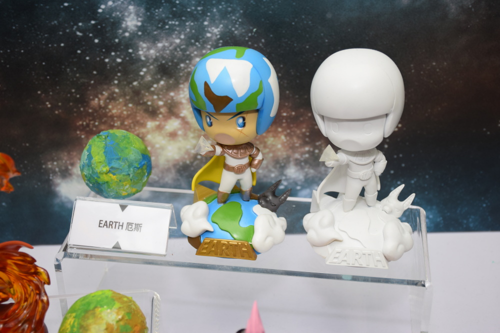 Creature figures on display at the expo